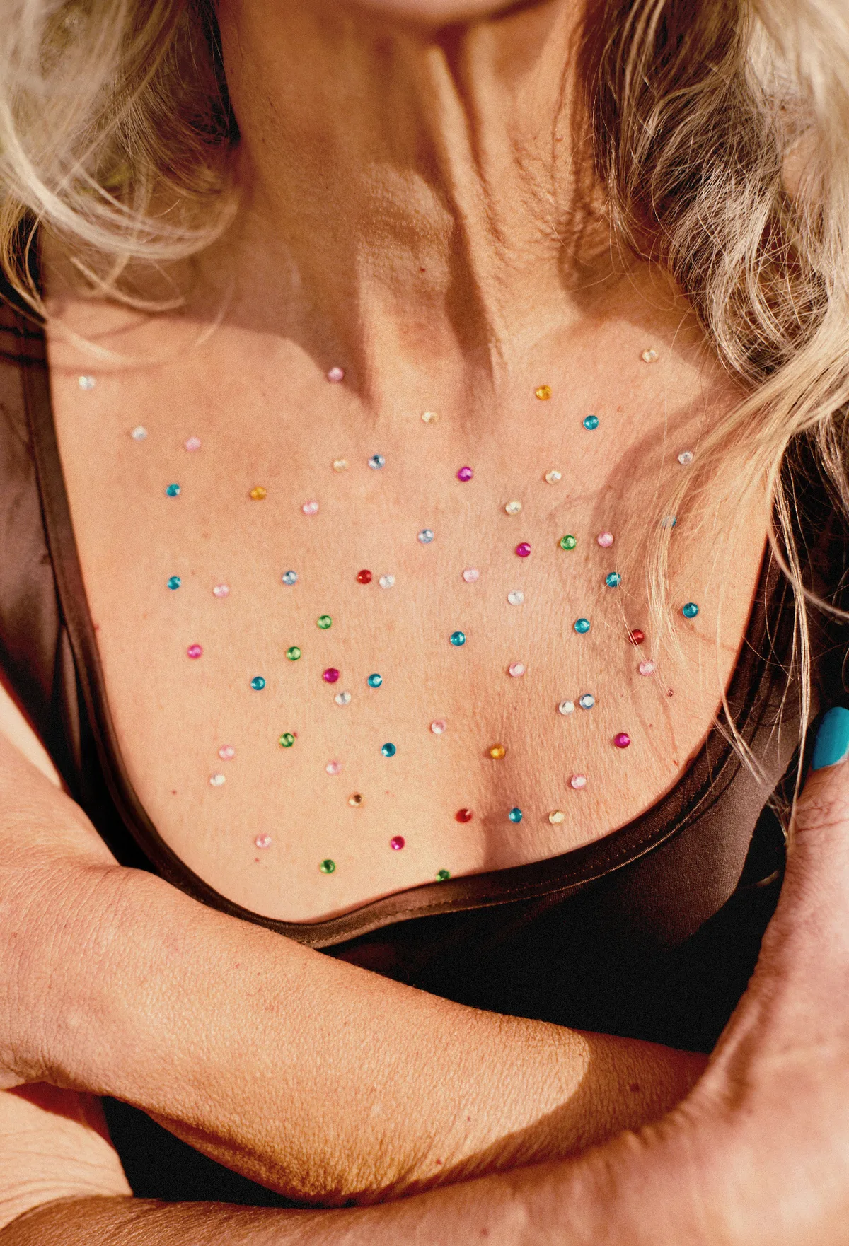 Sun-kissed skin scattered with tiny gems