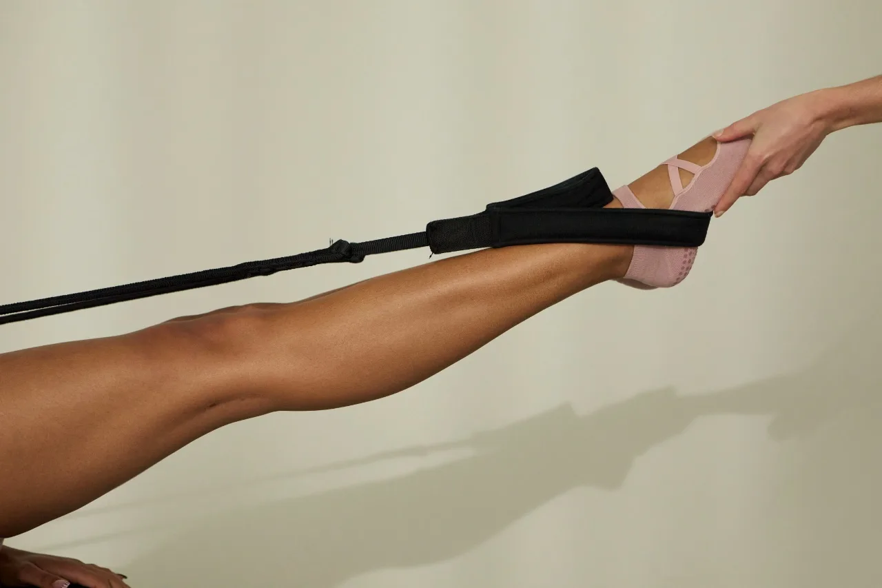Strong, clear legs in a pilates stretch
