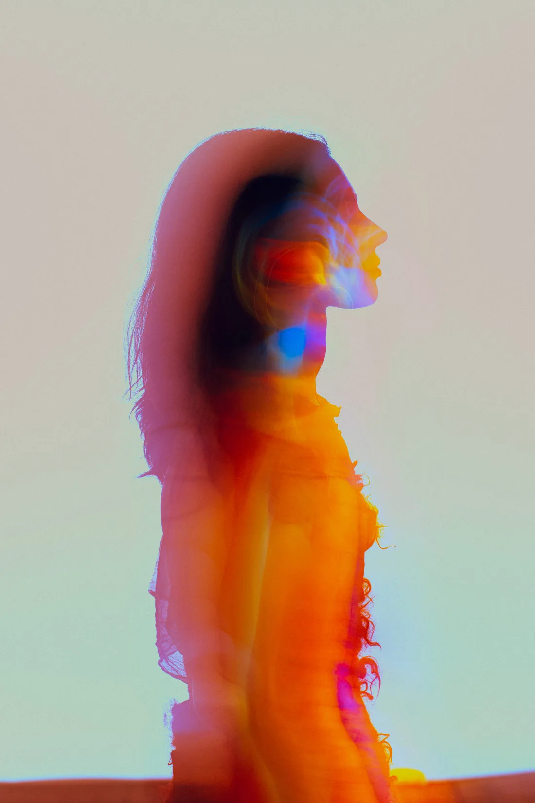 A woman in prismatic light, feeling renewed