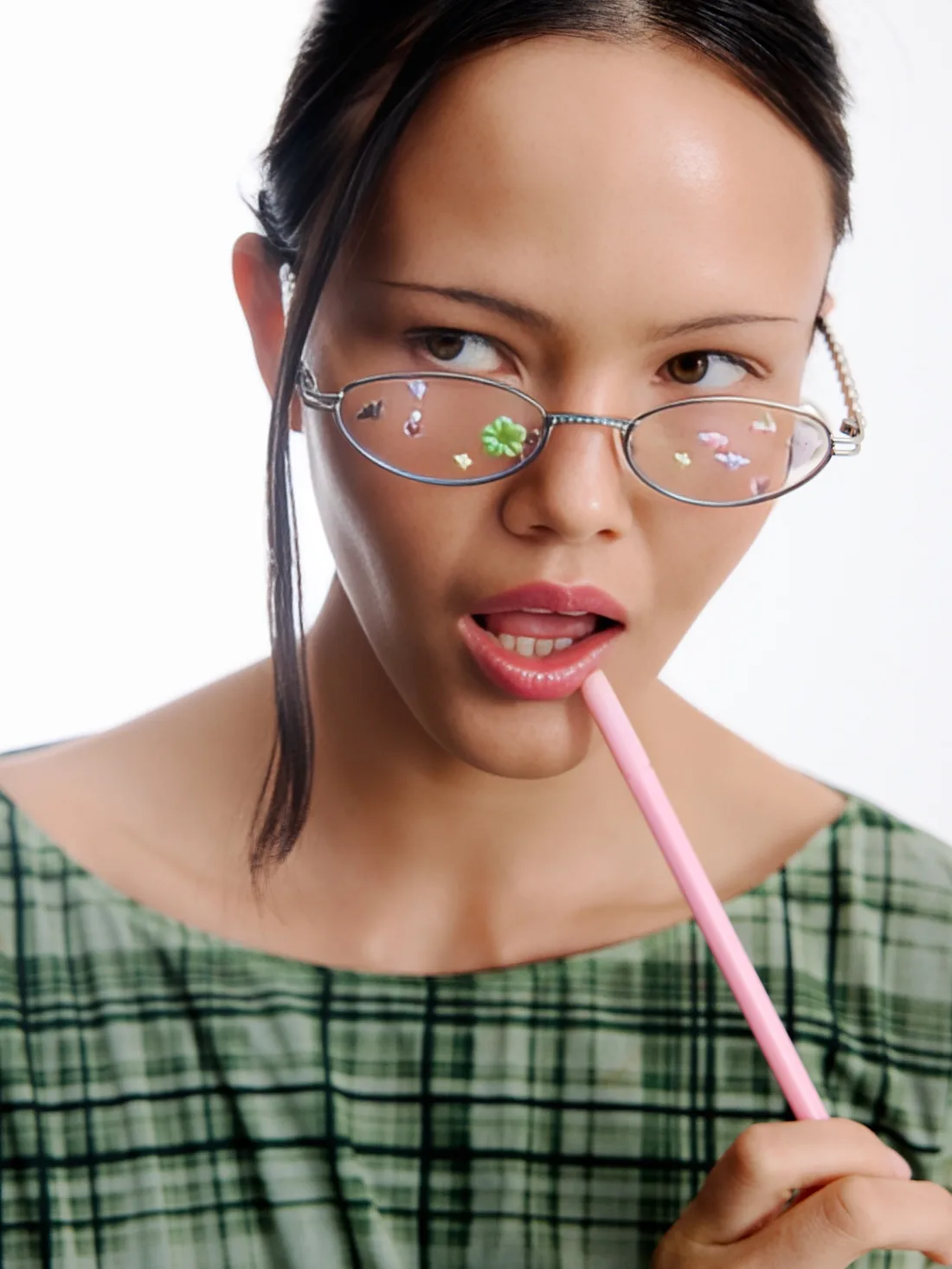 Clear, even skin with a playful pink straw