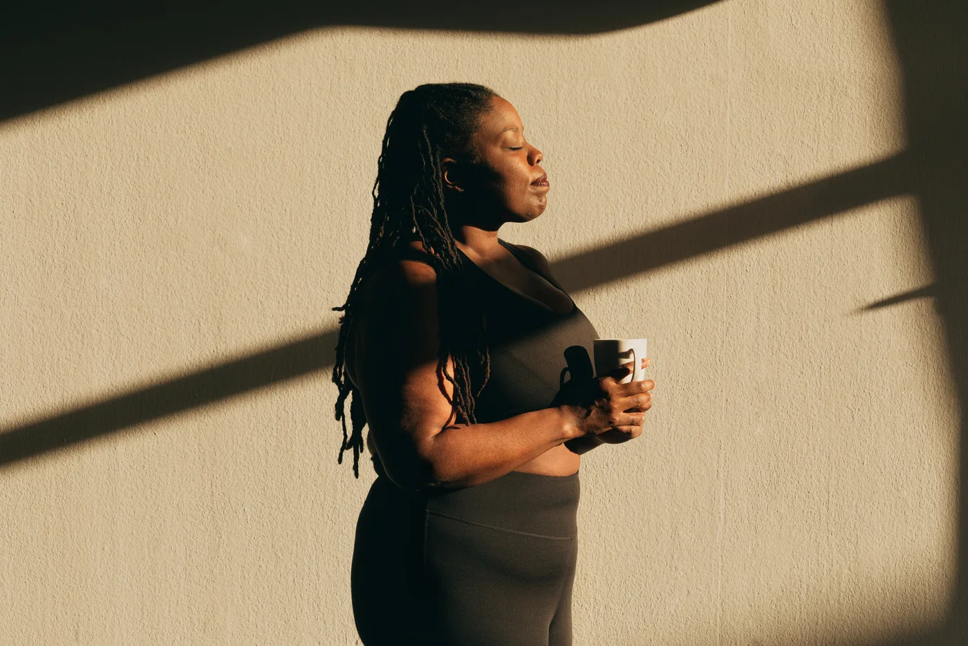 A quiet morning moment in the sun with a warm mug